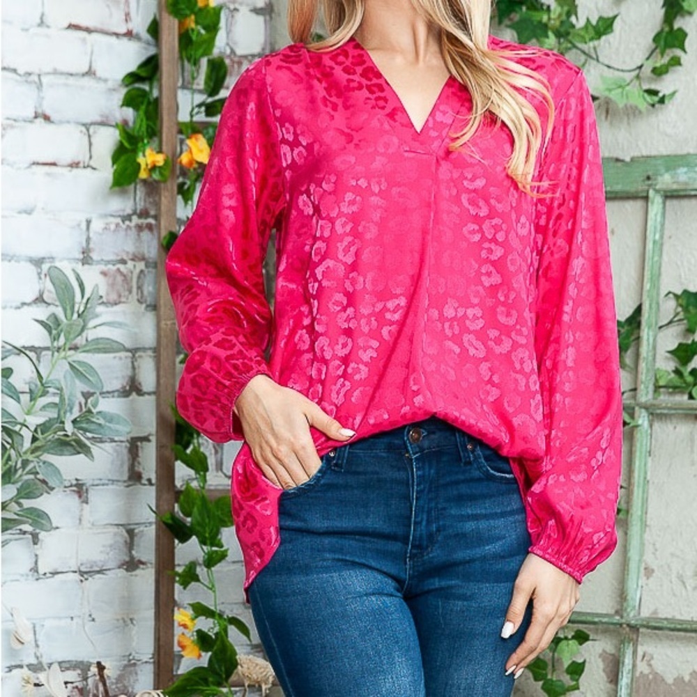Elegant Hot pink leopard print blouse. Perfect for date night, or office.
